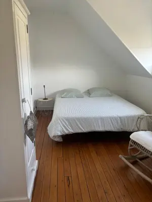 Un ou plusieurs lits dans un hébergement de l'établissement Maison de caractère Le Mans 3 min à pieds gare et tram, proche centre ville , garage