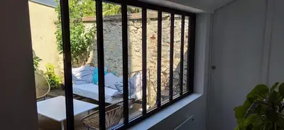 Balcon ou terrasse dans l'établissement Maison de caractère Le Mans 3 min à pieds gare et tram, proche centre ville , garage
