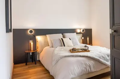 Un ou plusieurs lits dans un hébergement de l'établissement Immeuble H4 - cozy & comfortable stay