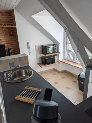 Cuisine ou kitchenette dans l'établissement Le Bleuet