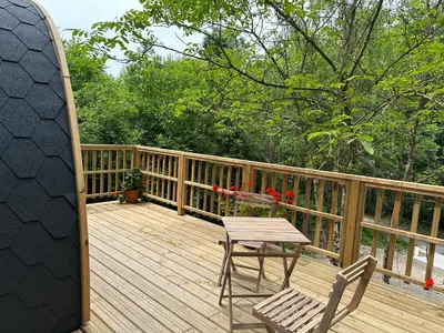 Balcon ou terrasse dans l'établissement LOGEMENT INSOLITE Pod sur Pilotis
