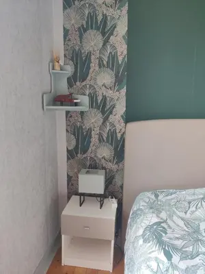Un ou plusieurs lits dans un hébergement de l'établissement charmante chambre chez l'habitant