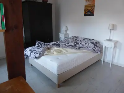 Un ou plusieurs lits dans un hébergement de l'établissement Studio calme au coeur de Tours