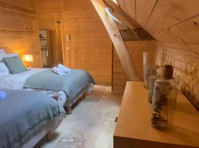 Un ou plusieurs lits dans un hébergement de l'établissement Le Clos de la Rodaie Bourgueil Loire Valley