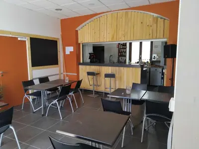 Cuisine ou kitchenette dans l'établissement Village Vacances Les Fontenils