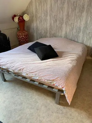 Un ou plusieurs lits dans un hébergement de l'établissement Chambres à louer