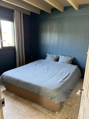 Un ou plusieurs lits dans un hébergement de l'établissement Le chalet