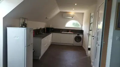 Cuisine ou kitchenette dans l'établissement Appartement 8 pers neuf 80m2