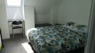 Un ou plusieurs lits dans un hébergement de l'établissement Appartement 8 pers neuf 80m2