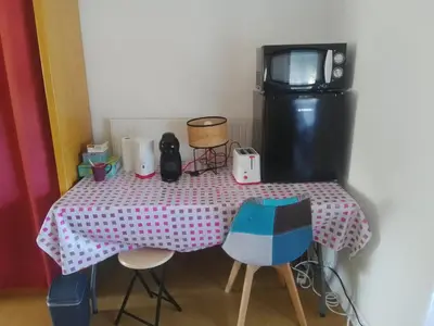 Cuisine ou kitchenette dans l'établissement domdom72