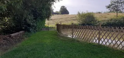 Jardin de l'établissement Maison avec mare