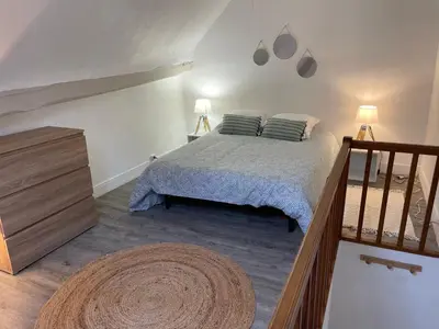 Un ou plusieurs lits dans un hébergement de l'établissement Charmante Maison La Source 2p 50m2 Quartier Paul Bert