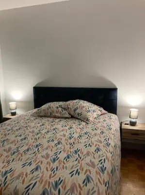 Un ou plusieurs lits dans un hébergement de l'établissement Gîte Coccinelle