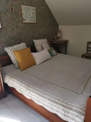 Un ou plusieurs lits dans un hébergement de l'établissement Grande maison de Touraine avec piscine chauffée