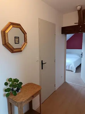 Un ou plusieurs lits dans un hébergement de l'établissement Gîte au milieu des vignes