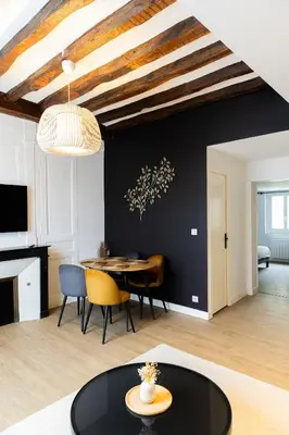Télévision ou salle de divertissement dans l'établissement Logement quartier historique