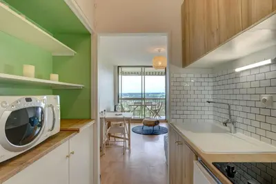 Cuisine ou kitchenette dans l'établissement L'Écrin d'Elteville - Charmant studio