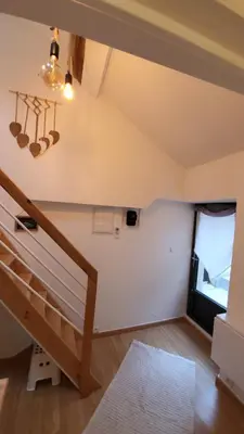 Un ou plusieurs lits dans un hébergement de l'établissement Studio cosy climatisé