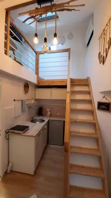 Cuisine ou kitchenette dans l'établissement Studio cosy climatisé