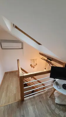 Un ou plusieurs lits dans un hébergement de l'établissement Studio cosy climatisé