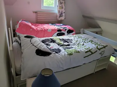 Un ou plusieurs lits dans un hébergement de l'établissement Le domaine du chêne vert