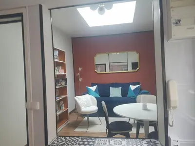 Coin salon dans l'établissement Maison cosy citadine