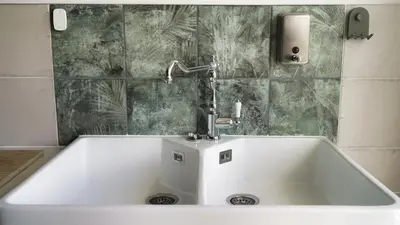 Salle de bains dans l'établissement Le Toucan