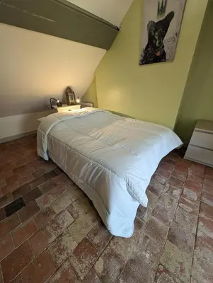 Un ou plusieurs lits dans un hébergement de l'établissement La rose d'Alfred