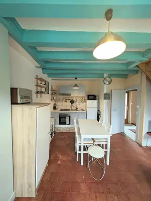 Cuisine ou kitchenette dans l'établissement La rose d'Alfred