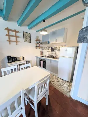 Cuisine ou kitchenette dans l'établissement La rose d'Alfred