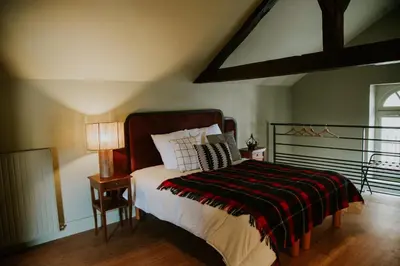 Un ou plusieurs lits dans un hébergement de l'établissement Chambres d'hôte - Maison des écrivains - 50 m de la cathédrale et place des jacobins