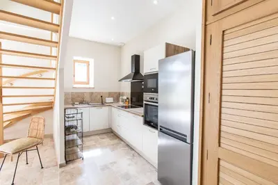 Cuisine ou kitchenette dans l'établissement Château de Conon - Gîte l'Orangerie