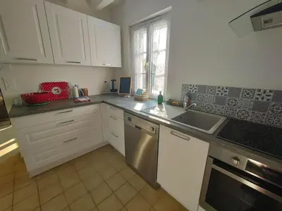 Cuisine ou kitchenette dans l'établissement Le trainefeuilles,confortable,chaleureux,200m du zoo