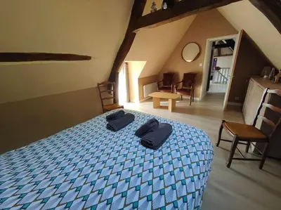 Un ou plusieurs lits dans un hébergement de l'établissement Le trainefeuilles,confortable,chaleureux,200m du zoo