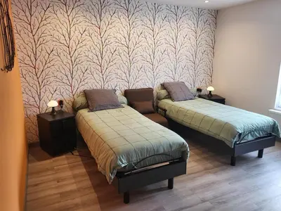 Un ou plusieurs lits dans un hébergement de l'établissement Gîte cosy avec jardin, terrasse et parking entre Châteaux de la Loire et ZooParc de Beauval - FR-1-491-350