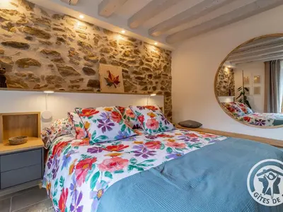 Un ou plusieurs lits dans un hébergement de l'établissement Chambre d'hôtes avec piscine et petit-déjeuner proche d'Angers - FR-1-622-84
