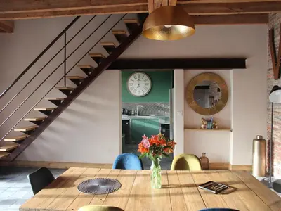 Coin salon dans l'établissement Gîte de charme avec spa, piscine intérieure et jardin clos près de Chinon - FR-1-381-553