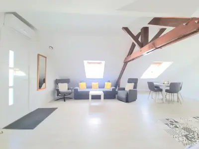 Coin salon dans l'établissement Appartement, proche Gare et Centre-Ville