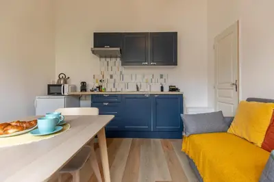Cuisine ou kitchenette dans l'établissement Confort Modernité Centre Ville Parking Gratuit