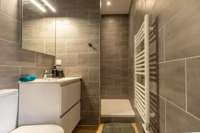 Salle de bains dans l'établissement Confort Modernité Centre Ville Parking Gratuit