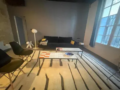 Coin salon dans l'établissement Logement Quartier Historique Calme et Parking