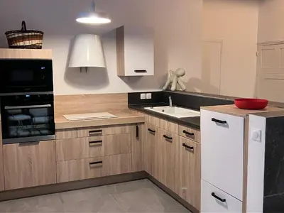 Cuisine ou kitchenette dans l'établissement Logement Quartier Historique Calme et Parking
