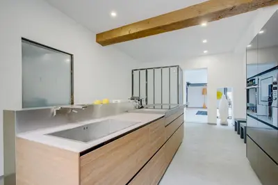 Cuisine ou kitchenette dans l'établissement Logement atypique 200m2 au Calme et Confort