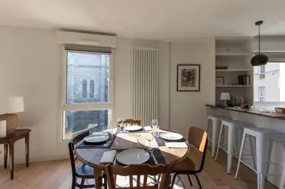 Cuisine ou kitchenette dans l'établissement Appartement Hyper Centre Parking Privée