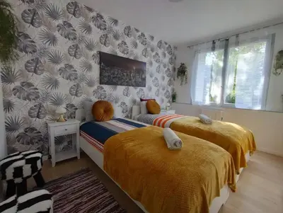 Un ou plusieurs lits dans un hébergement de l'établissement Appartement charmant à Noyers-sur-Cher - 45 m² - Parking