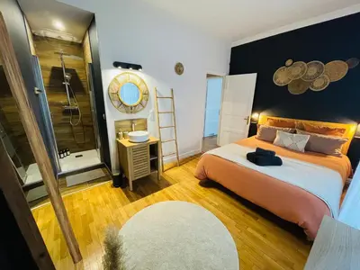 Un ou plusieurs lits dans un hébergement de l'établissement Appartement de standing hyper centre