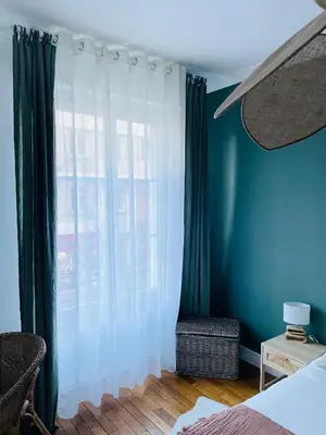 Un ou plusieurs lits dans un hébergement de l'établissement Appartement de standing hyper centre