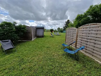 Jardin de l'établissement Gîte studio 2 pers Le Bleuet entre Loire et Sologne