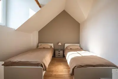 Un ou plusieurs lits dans un hébergement de l'établissement La Maison Tourangelle - Maison de Famille à Tours