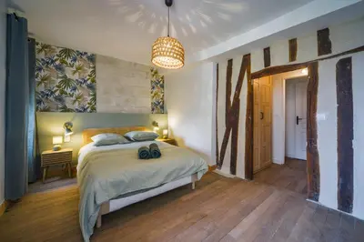 Un ou plusieurs lits dans un hébergement de l'établissement Maison avec spa dans l'hypercentre de Blois